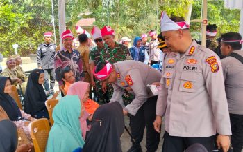 Gelar Ekspedisi Merah Putih di Kampar, Polda Riau Beri Bantuan Sosial hingga Bentangkan Bendera 81 Meter